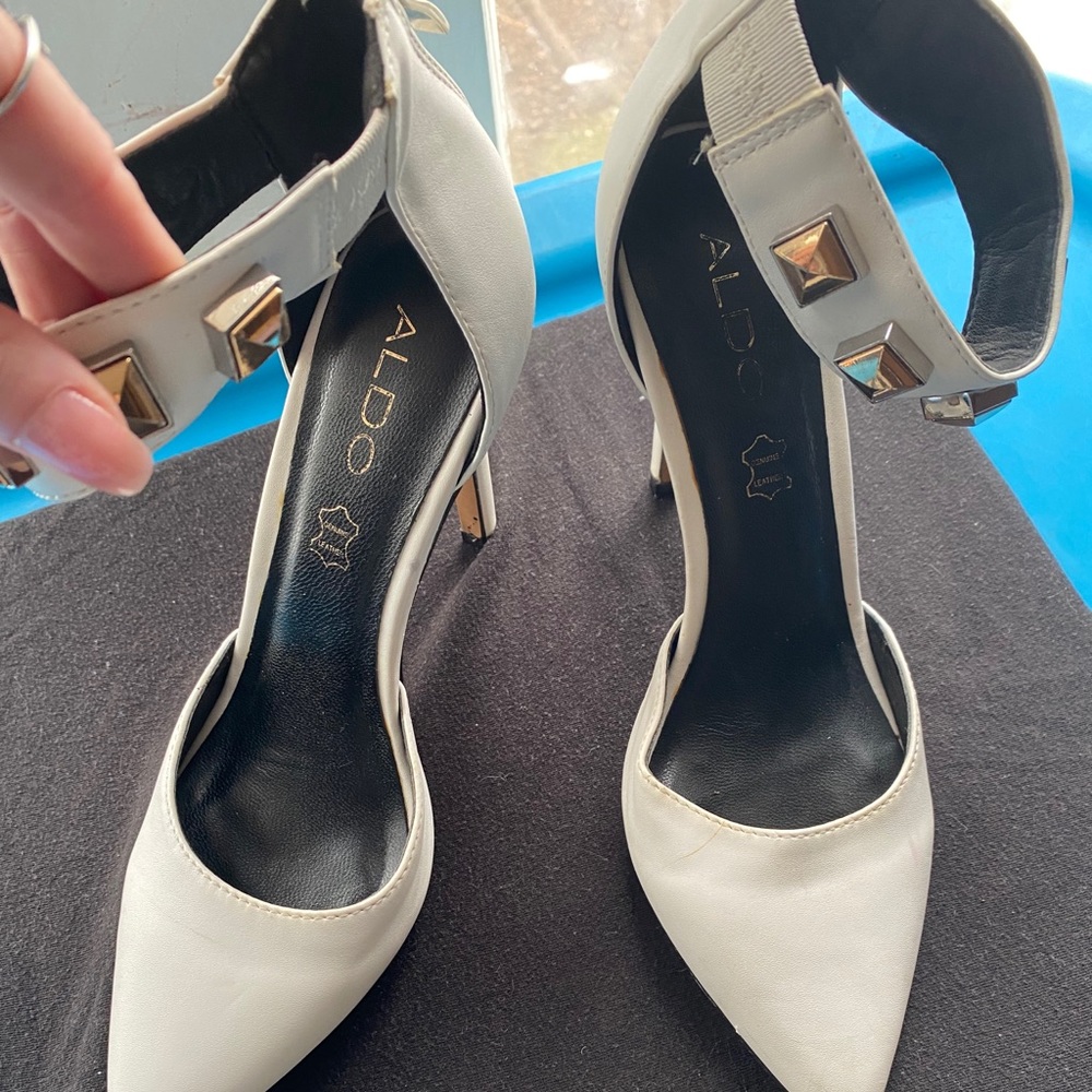 Aldo white pumps